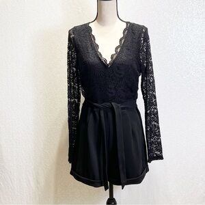 Black lace v neck romper size Large from IRIS